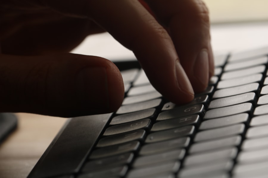 Hands typing on a keyboard